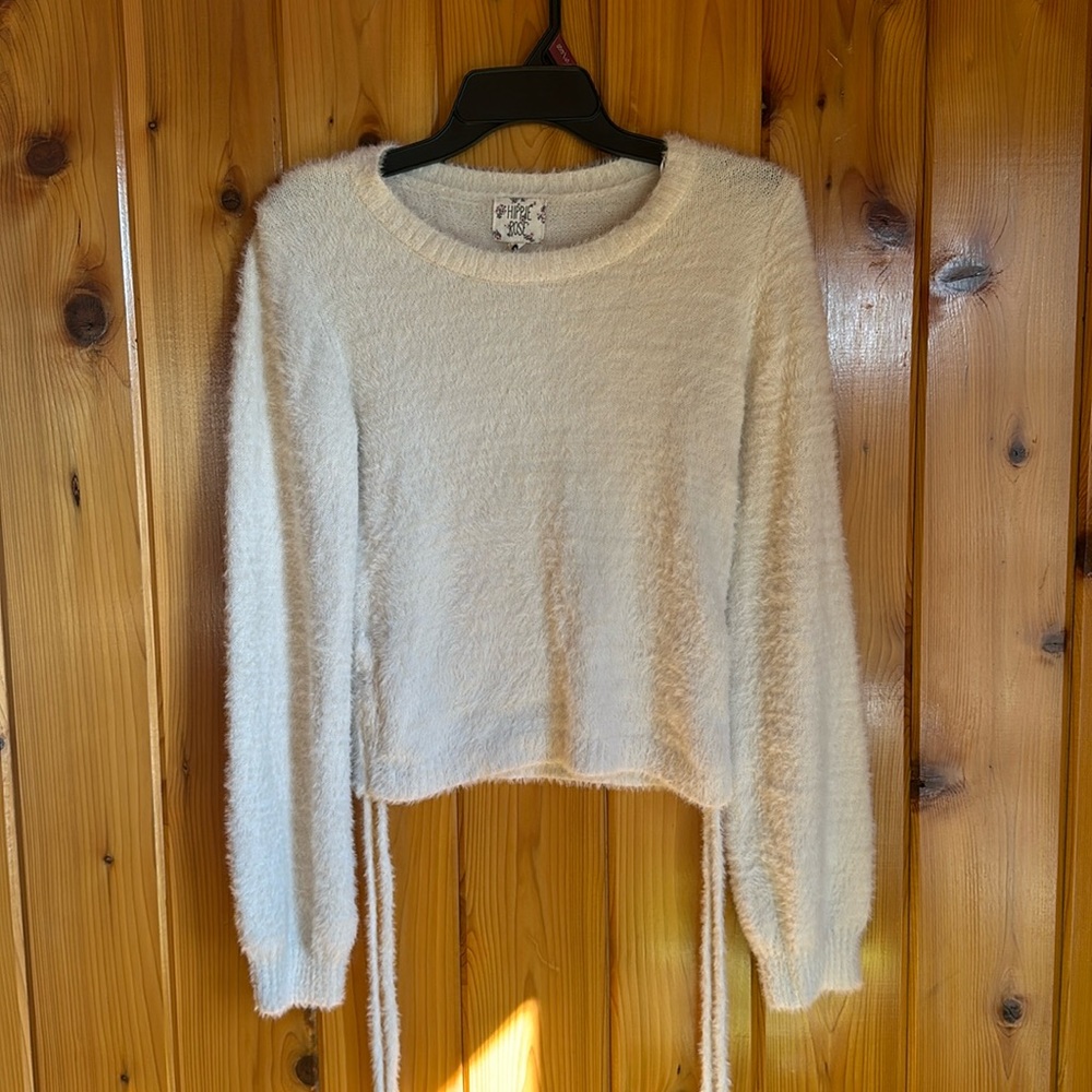 A cream sweater